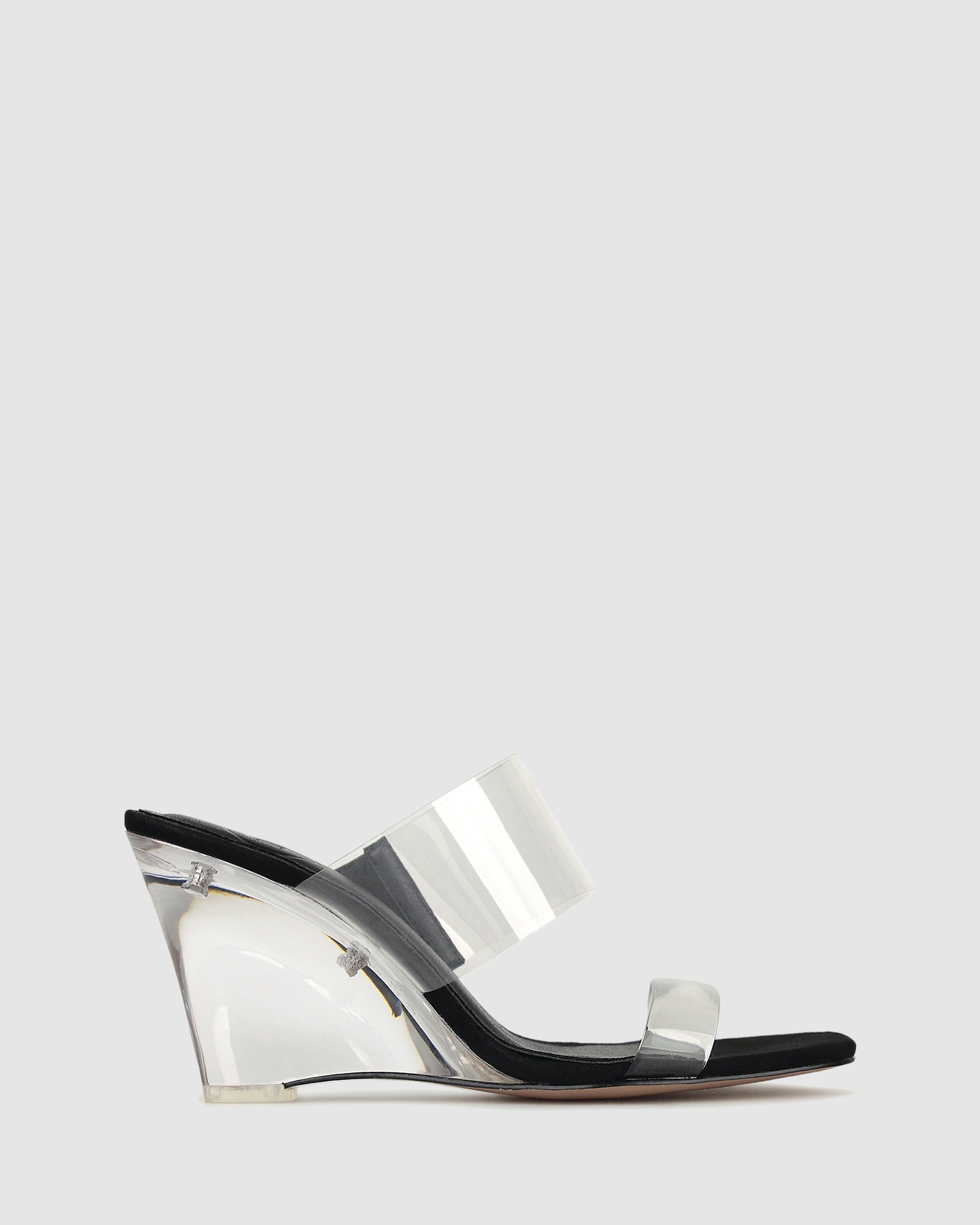 Keely Vynalite Wedge Mules Black/Clear by Zu | ShoeSales